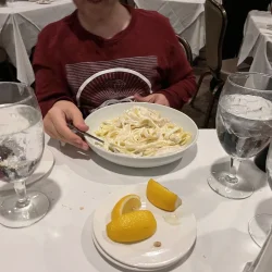 Our editor&#039;s son works on a bowl of fettuccini chicken alfredo at Rico&#039;s Restaurant in Ross Township, Pa. (Across North Hills photo/Matt De Reno)