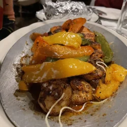 Baked seafood sampler platter with a few strands of wayward angel hair pasta from our editor&#039;s plate at Rico&#039;s Restaurant in Ross Township, Pa., Thursday, Sept. 30, 2021 (Across North Hills photo/Matt De Reno)